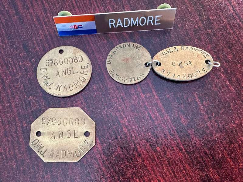 Dog tags and name plate for col. Radmore, border war period