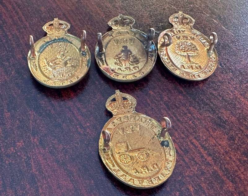 Rifle association badges for Cape, Free State, Transvaal and Natal. Lugs intact