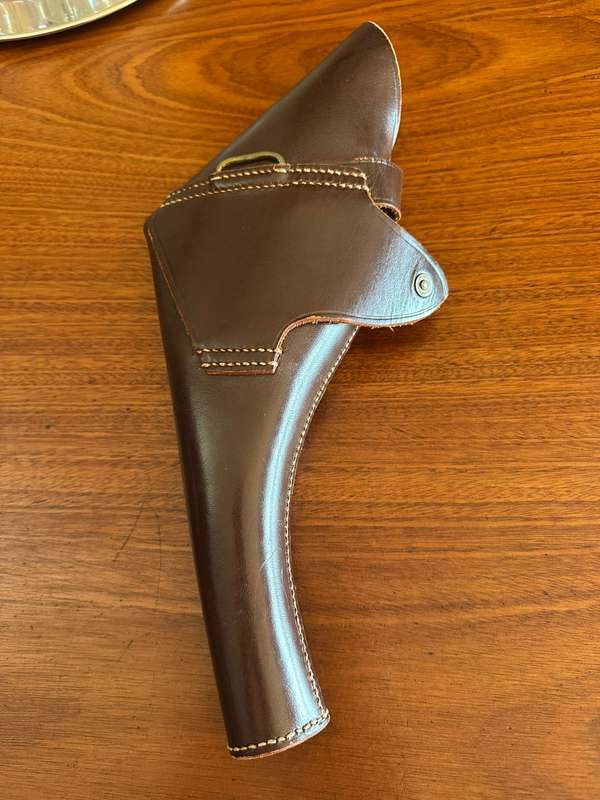 Leather holster for the long barrel Webley revolver. Good condition. RSA and SAP markings.