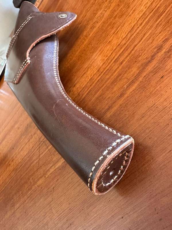 Leather holster for the long barrel Webley revolver. Good condition. RSA and SAP markings.