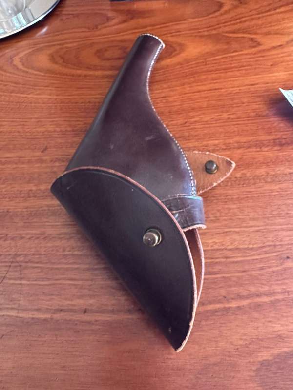Leather holster for the long barrel Webley revolver. Good condition. RSA and SAP markings.