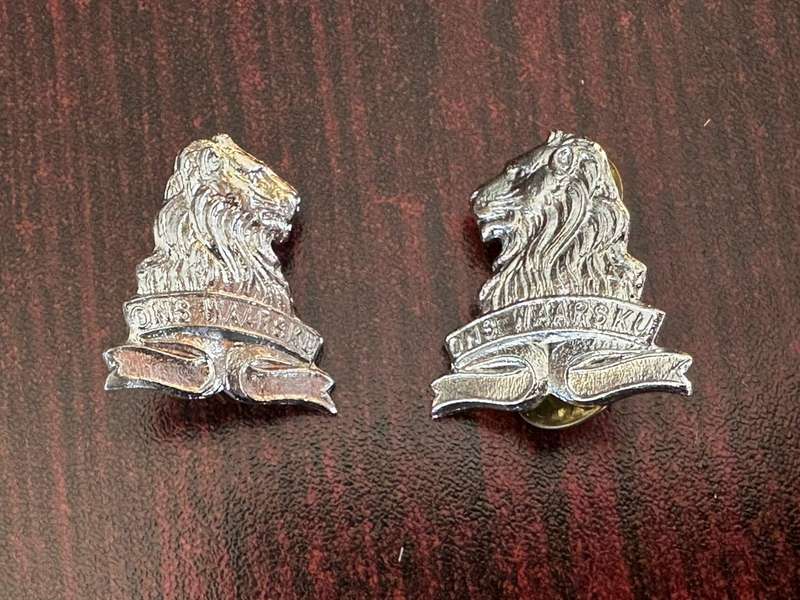 Regiment De La Rey chromed collar badges,worn from 1976. Pins intact