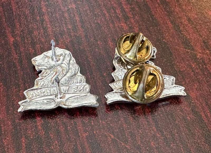 Regiment De La Rey chromed collar badges,worn from 1976. Pins intact