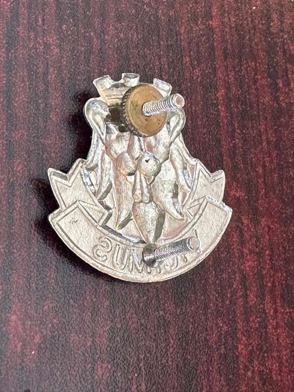 2 SA Cape Corps battalion cap badge. Chromed scroll variation. Approved in 1987. 2 Lugs
