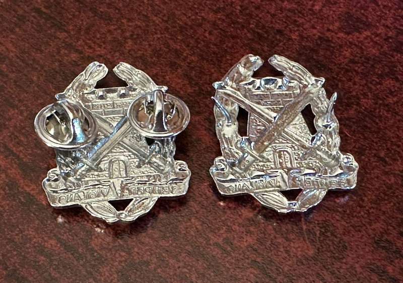 Special Services Corps ,chrome collar badge pair. Worn from 1970's. Pins intact