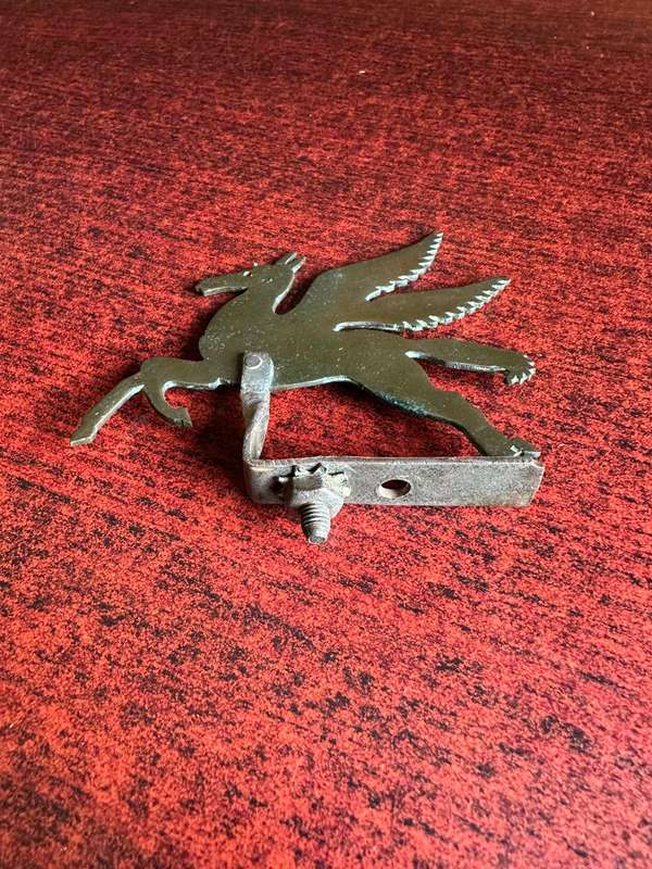 Flying Springbok device (field made) for mounting on top of pith helmet during parades etc. Worn by