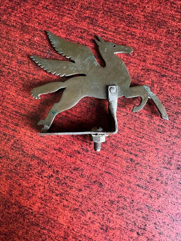 Flying Springbok device (field made) for mounting on top of pith helmet during parades etc. Worn by