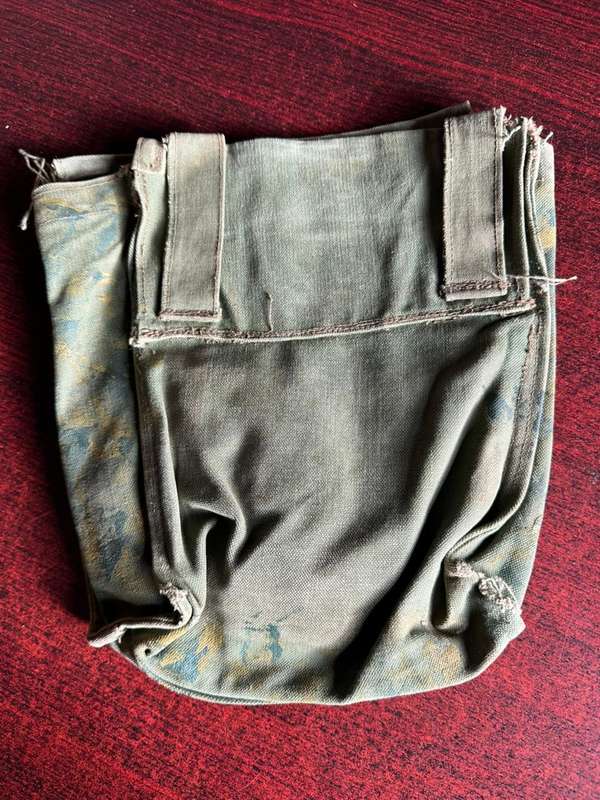 Rhodesian ammo bag. Original hand painted item, with members name on the inside. Measures 26x22 cm.