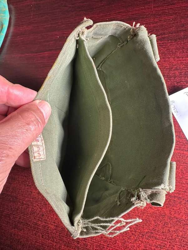 Rhodesian ammo bag. Original hand painted item, with members name on the inside. Measures 26x22 cm.