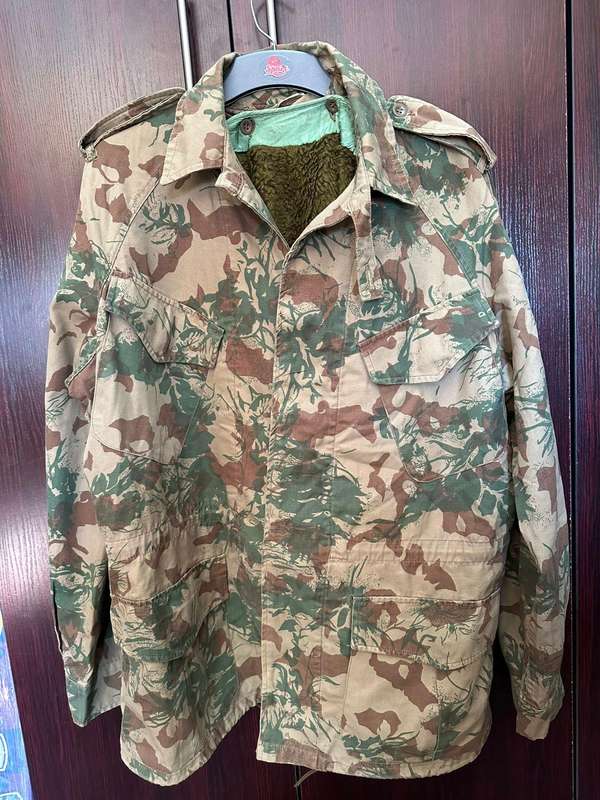 Task force second pattern camo jacket,with removable,wool liner. Size large to xtra large. Measures