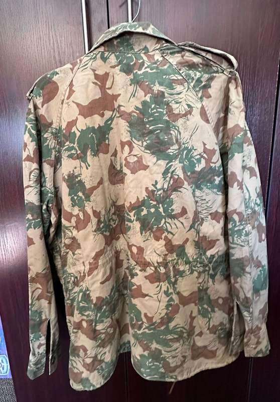 Task force second pattern camo jacket,with removable,wool liner. Size large to xtra large. Measures