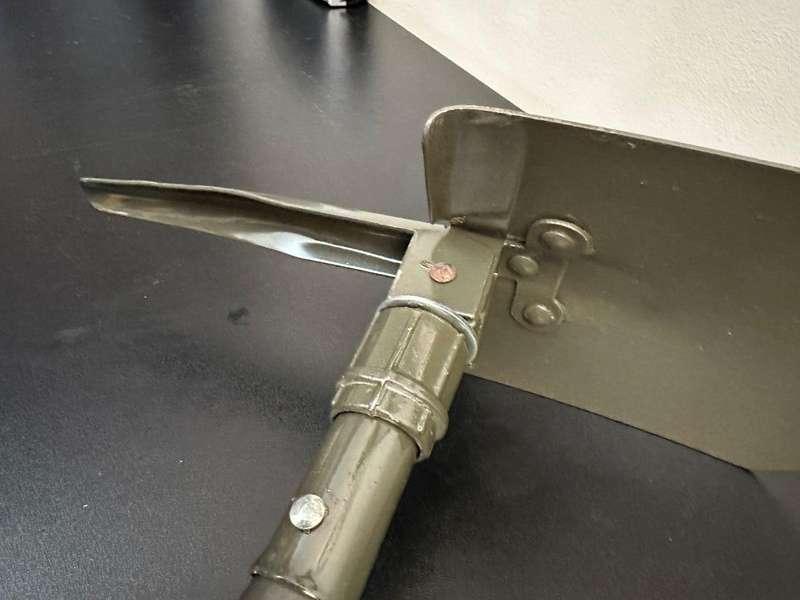 Portable, foldable spade with pick on the one side,length folded 47cm. Condition unused