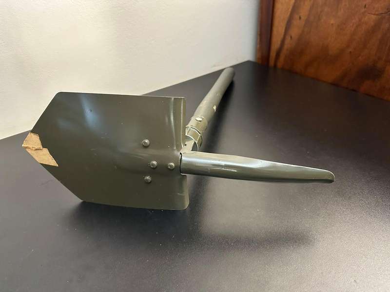 Portable, foldable spade with pick on the one side,length folded 47cm. Condition unused