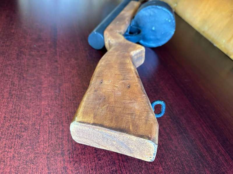 Well made metal and wood rifle from the Rhodesian war period. Come with kit and uniforms from a form