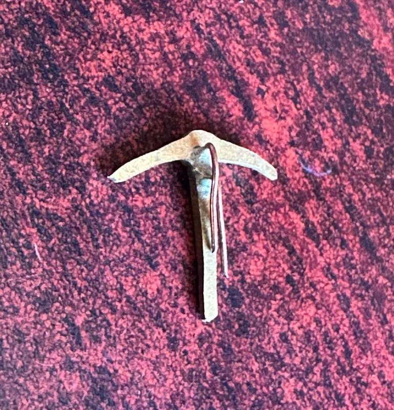 Rhodesian brass pick emblem,denotes an act of bravery,distinguished service, or continuous devotion