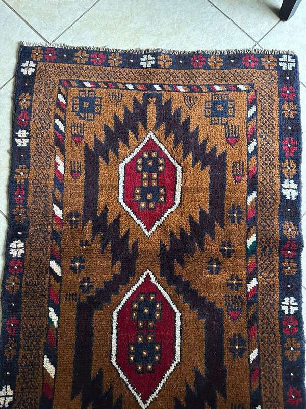 Authentic Balouchi handmade Persian carpet. Measures 1410 X 860 mm. Condition unused