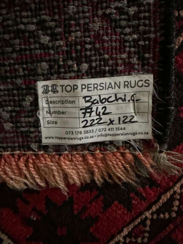 Authentic Balouchi handmade persian carpet. Measures 2220 X 1220mm. Condition new/ unused