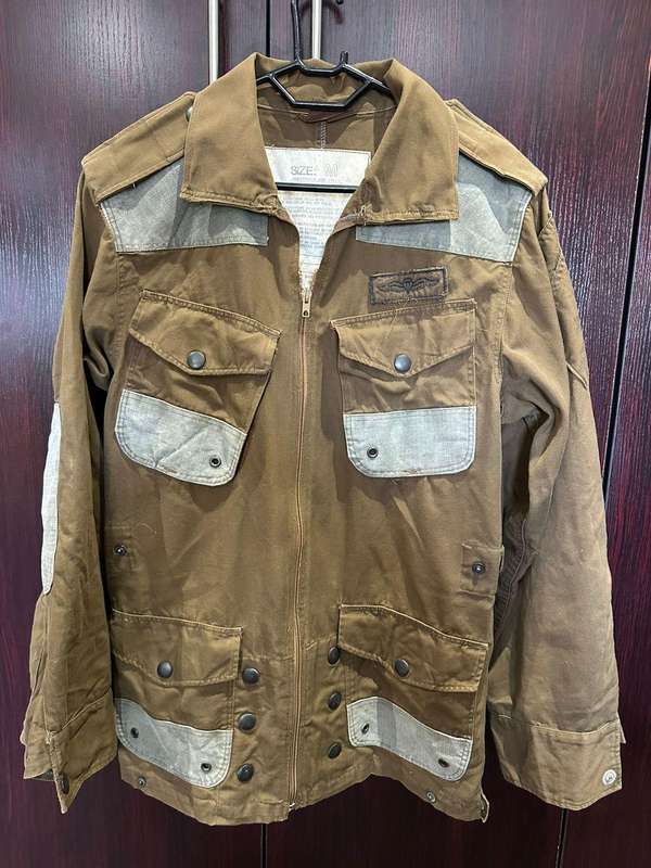 Border war period 2nd pasttern jump jacket. Labelled and dated 1985. Size medium. Measures 53 cm arm