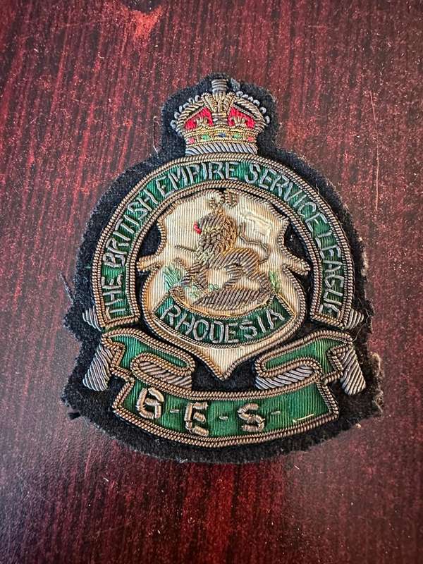 Rhodesia service league badge. Measures 95 x 70 mm.