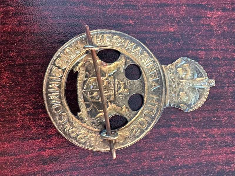 SA Corps of Commissionaires,voided centre. 2 Lugs. Measures 60 mm.