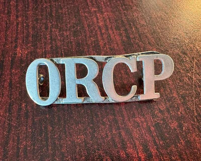 Orange River Colony Police shoulder title. Worn 1908- 1910. 2 Lugs. White metal.