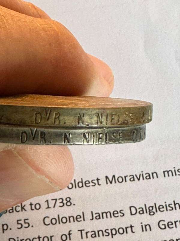 WW1 Group of 2. Copies of records named to Nielse N. charged with stealing public goods and taken in
