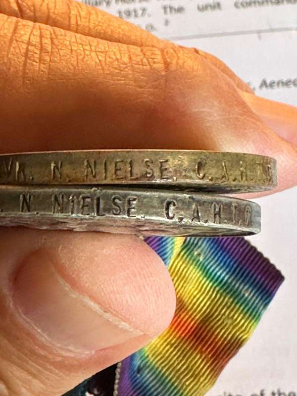 WW1 Group of 2. Copies of records named to Nielse N. charged with stealing public goods and taken in