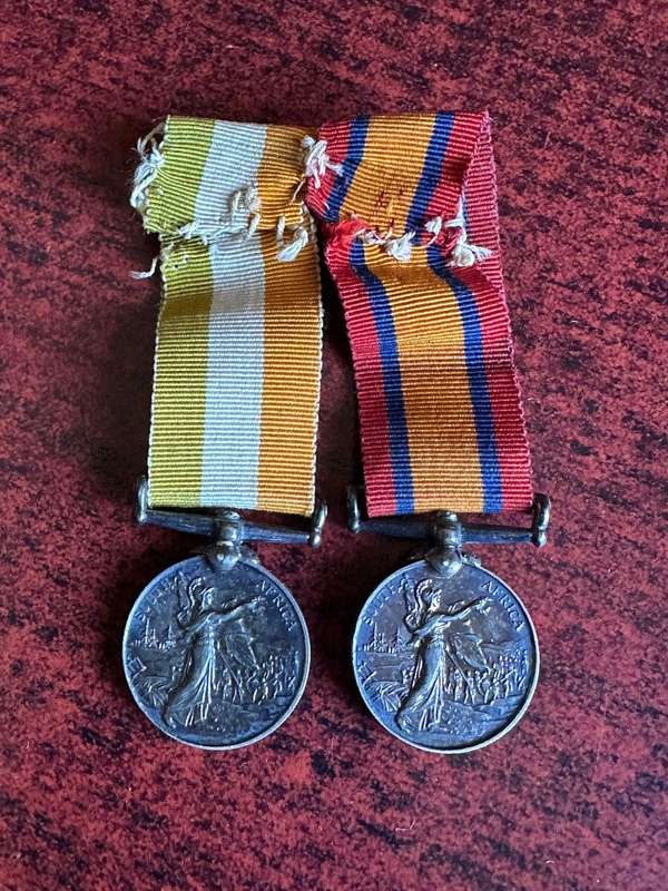 Authentic silver boer war , miniature QSA and KSA medals. Both with swivel suspenders.