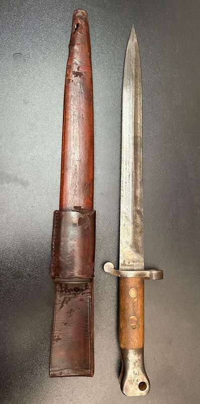Boer war pattern 1888 MK1, bayonet. Leather covered metal scabbard with frog. Wilkinson makers mark.