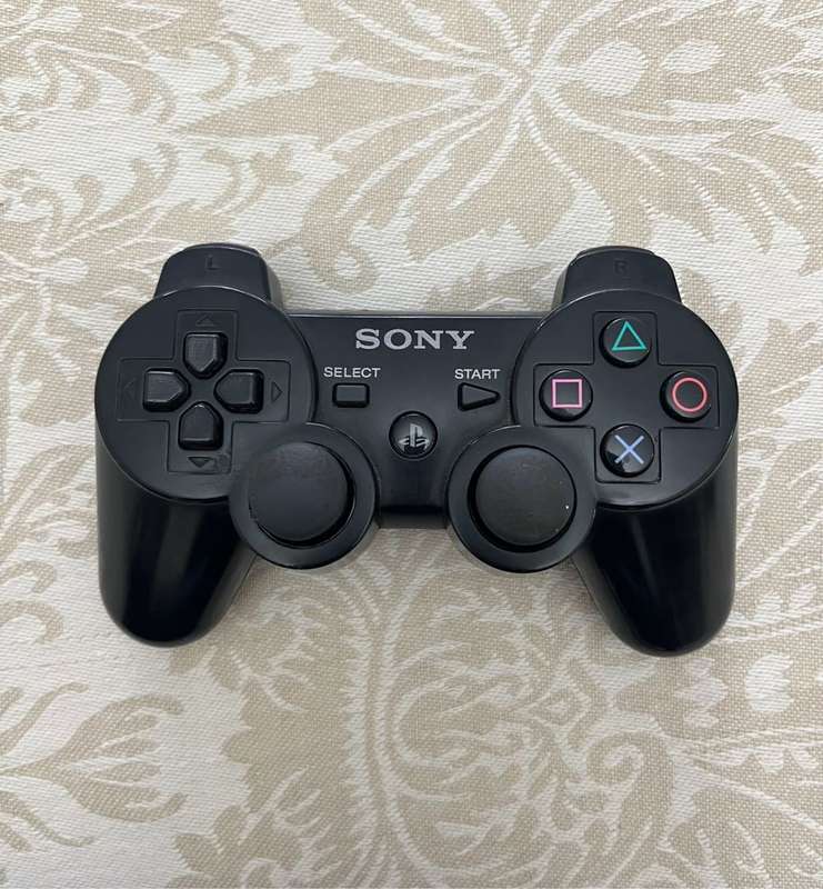 PS3 Slim (320GB) + 1 Game