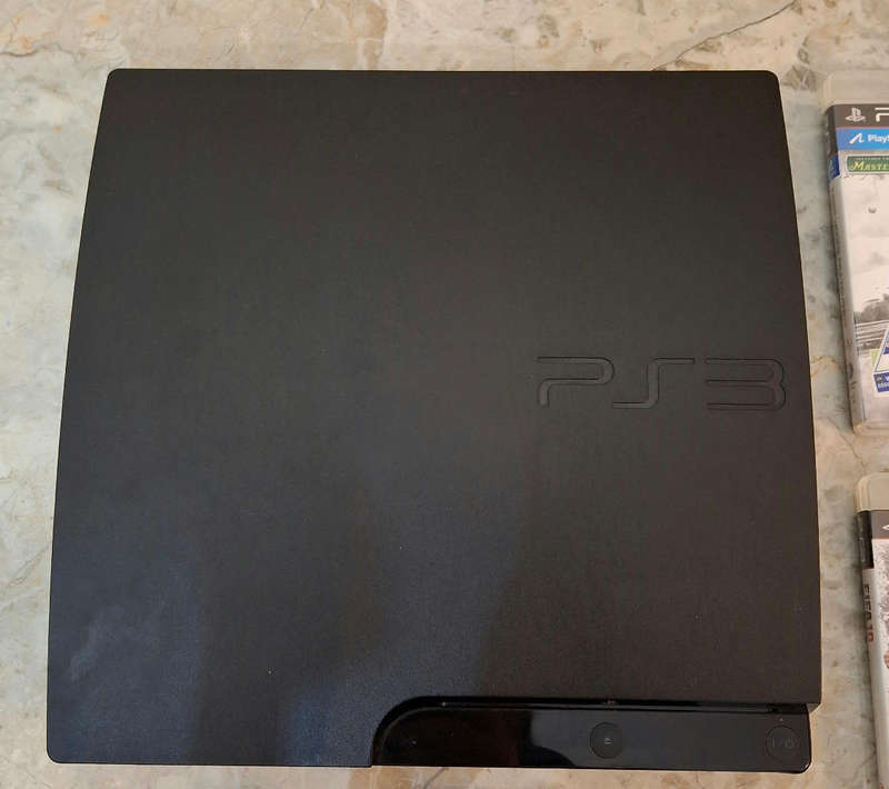 Sony PS3 160GB Console + 3 Games