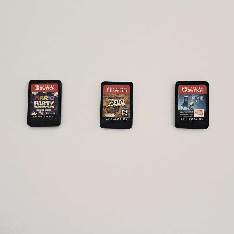 Nintendo Switch Lite + 3 Games