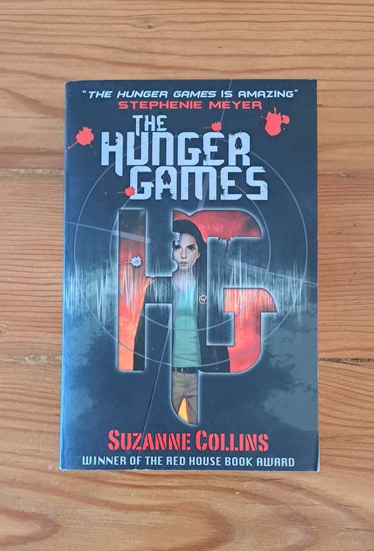 The Hunger Games By Suzanne Collins sic-fi fantasy adventure teen novel fiction young adult