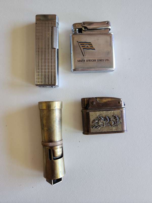 Collection of vintage lighters x 8