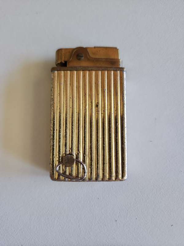 Collection of vintage lighters x 8