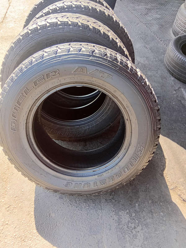 265/65/17 × 4  Bridgestone Dueler with 80% thread life