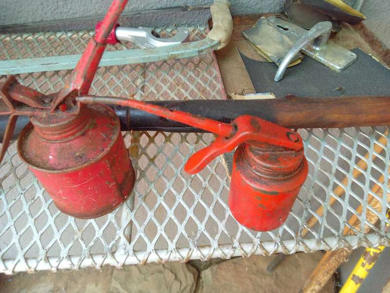 Vintage spout oil cans