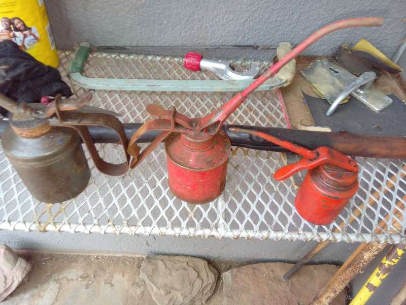 Vintage spout oil cans