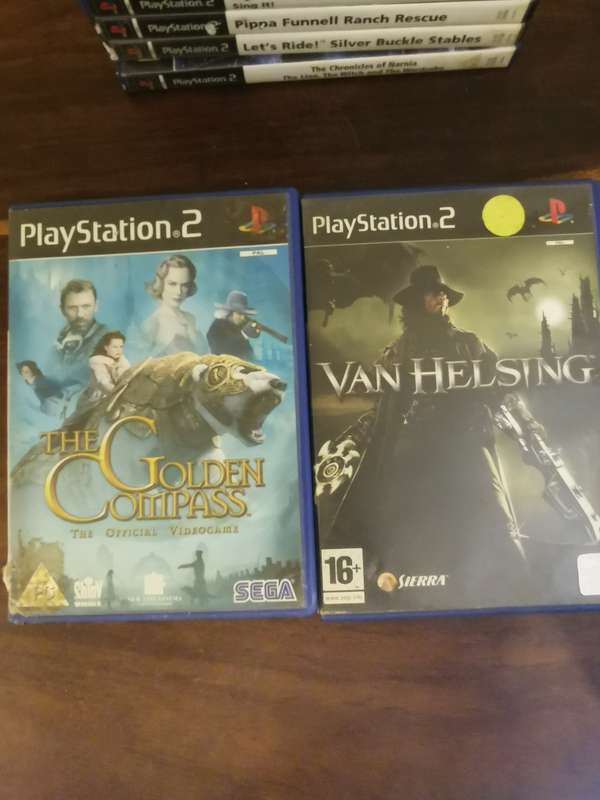 Massive Collection of PlayStation 2 Games with a Memory Card and Original Remote