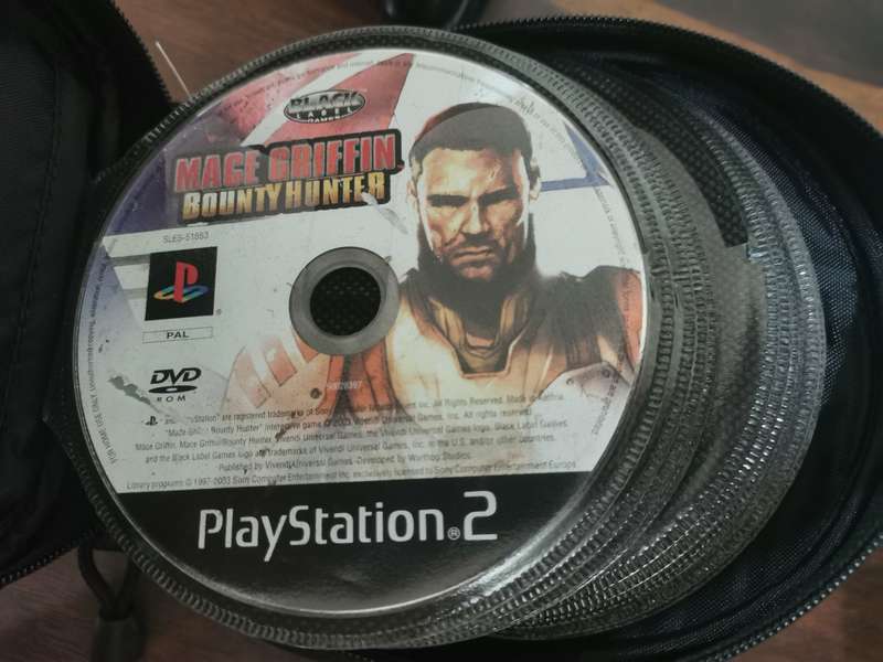 PlayStation 2 Fat Console with Remote and x7 Games