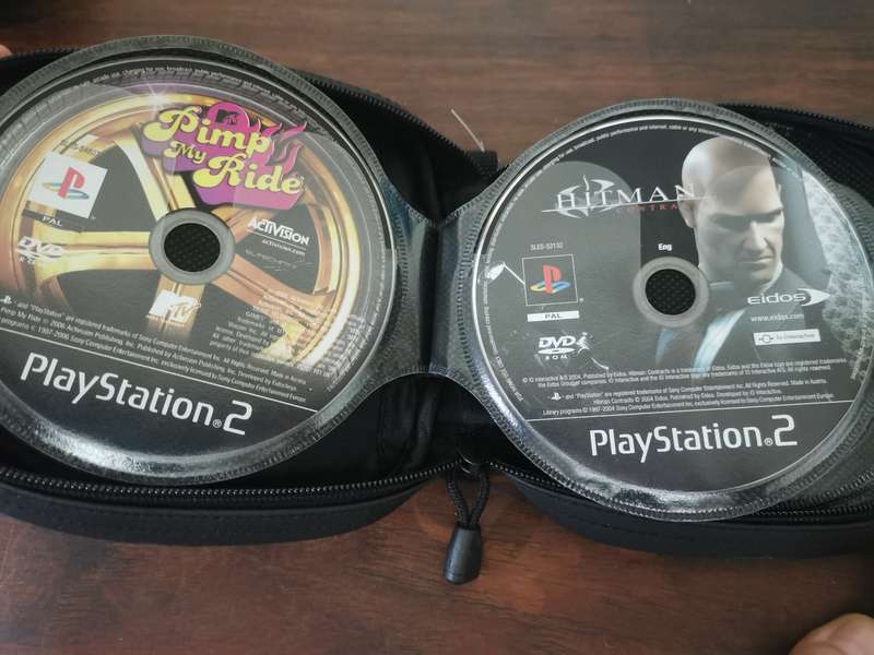 PlayStation 2 Fat Console with Remote and x7 Games