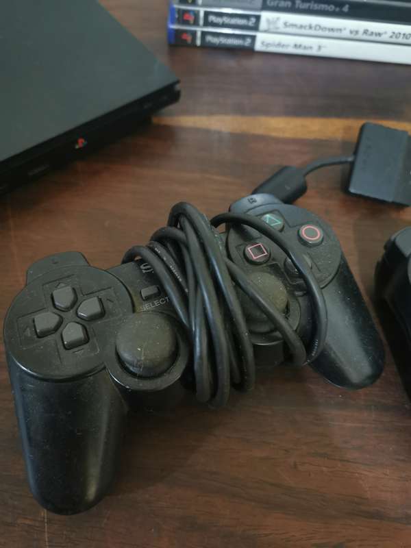 PlayStation 2 Console with Memory Card, Controllers and 7 Games
