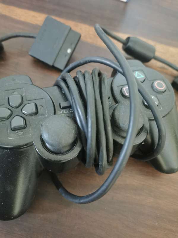 PlayStation 2 Console with Memory Card, Controllers and 7 Games