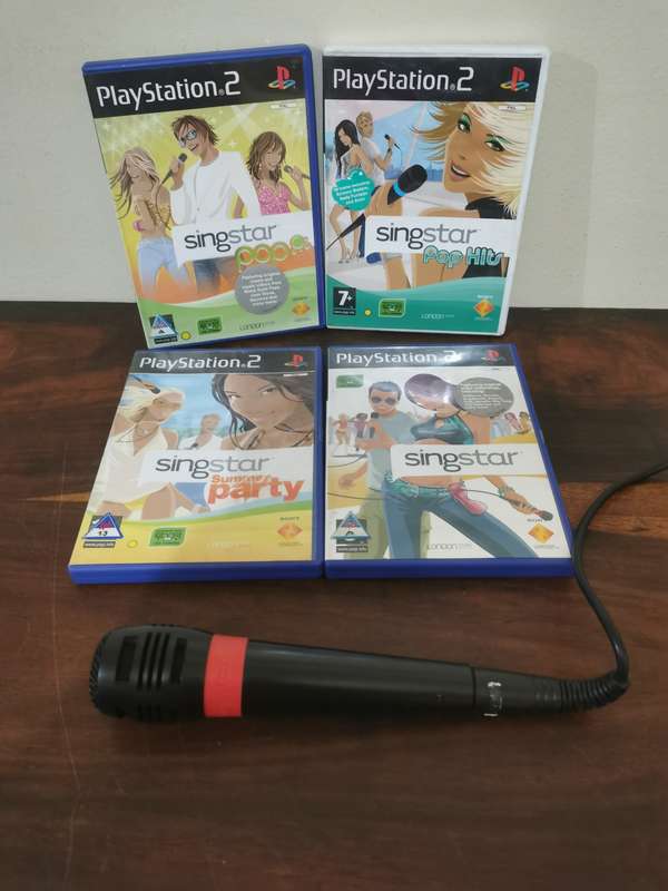 Singstar Game Collection on PlayStation 2 with an Extra Microphone