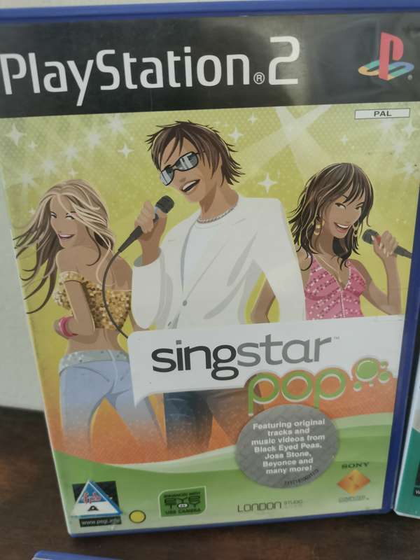 Singstar Game Collection on PlayStation 2 with an Extra Microphone