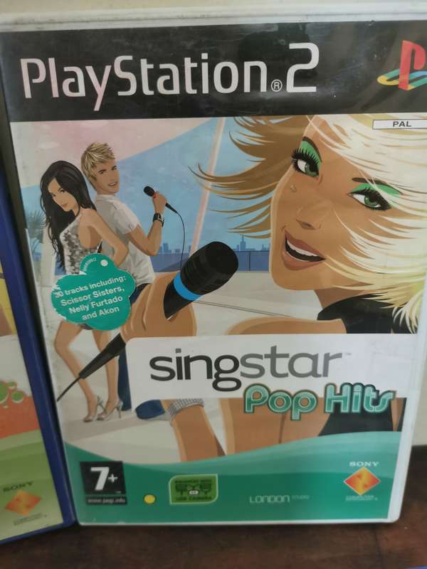 Singstar Game Collection on PlayStation 2 with an Extra Microphone