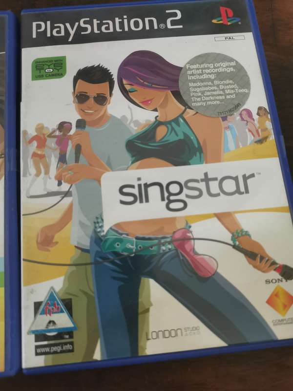 Singstar Game Collection on PlayStation 2 with an Extra Microphone