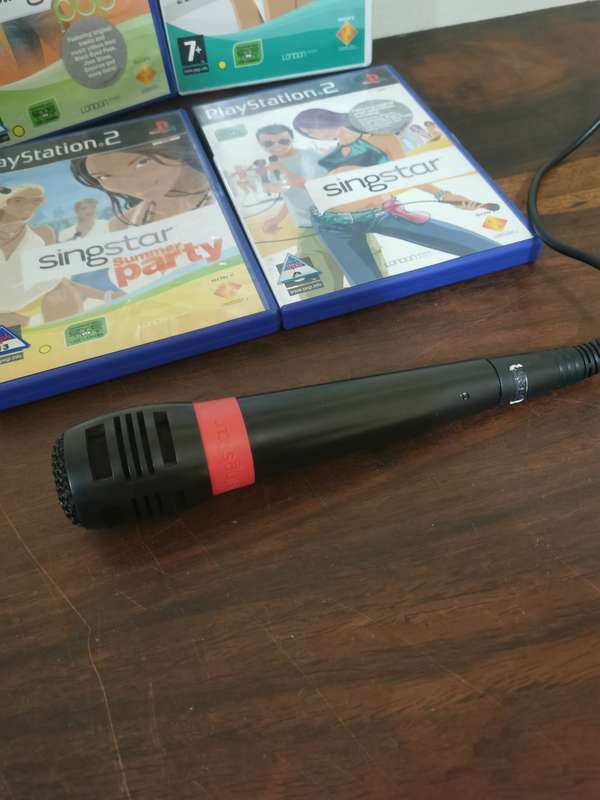 Singstar Game Collection on PlayStation 2 with an Extra Microphone