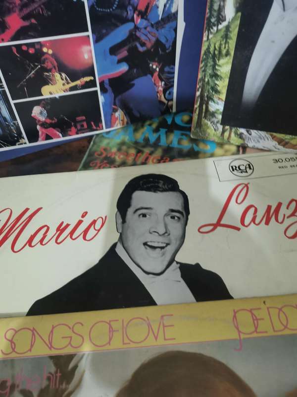 Collection of x8 Music LPs