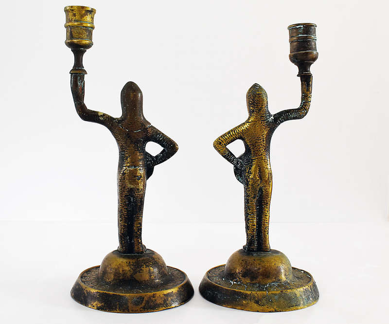 Pair of vintage solid brass medieval knight candlestick holders
